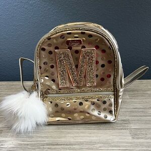 🆕 Justice Gold Backpack with Glitter Initial and Fur Pom Pom Charm